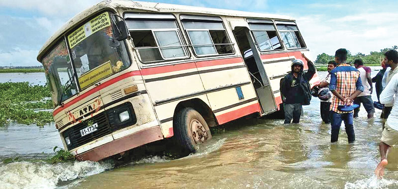 BUS MAROONED BY FLOODS | Daily News