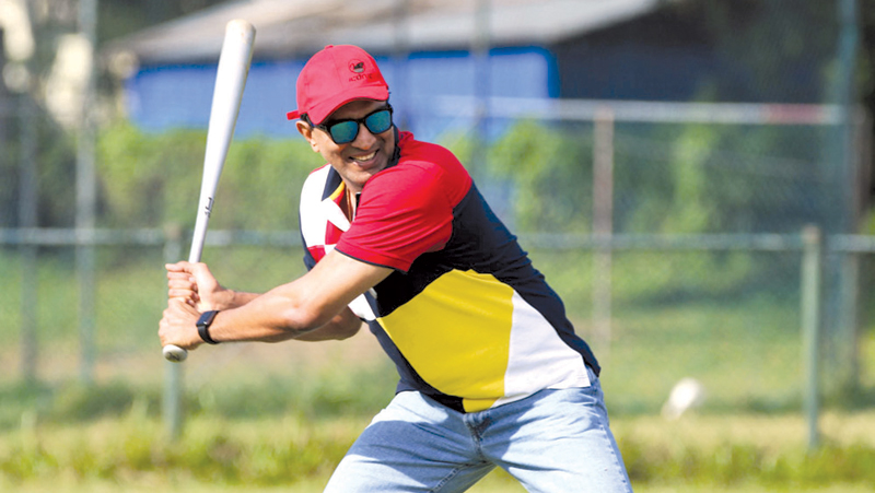 Priyantha Ekanayake displaying his all-round skills as CEO of the Sri Lanka Amateur Baseball/Softball Association.