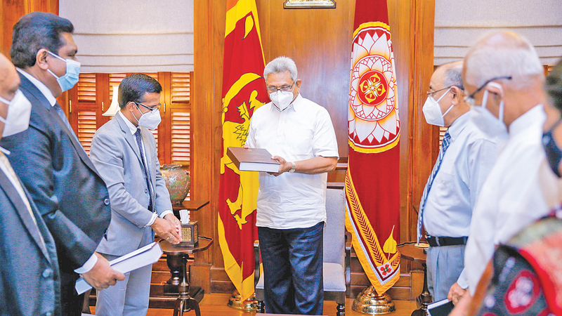 The Final Report of the Presidential Commission of Inquiry (PCoI) probing the Easter Sunday terror attacks was handed over to President Gotabaya Rajapaksa by its Chairman Supreme Court Justice Janak de Silva at the Presidential Secretariat yesterday. Members of the Commission, Secretary to the President Dr.P.B.Jayasundera and Principal Advisor to the President Lalith Weeratunga were present. Picture courtesy President’s Media Division 