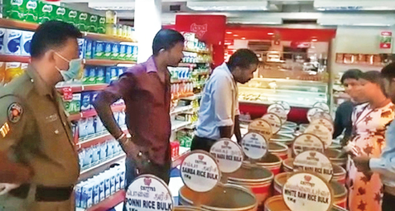 Officers of the Jaffna CAA have already taken legal action against the owners of seven shops who were found to be hoarding food. Picture by Rasula Dilhara
