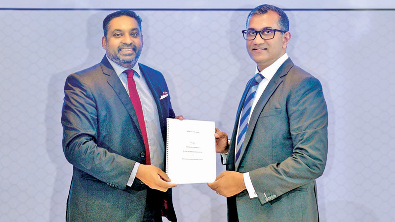 Gany Subramaniam, Chief Executive Officer Allianz Insurance Lanka and  Hemantha Gunetilleke Chief Executive Officer, Nations Trust Bank, exchange the partnership agreement of General Insurance Bancassurance.