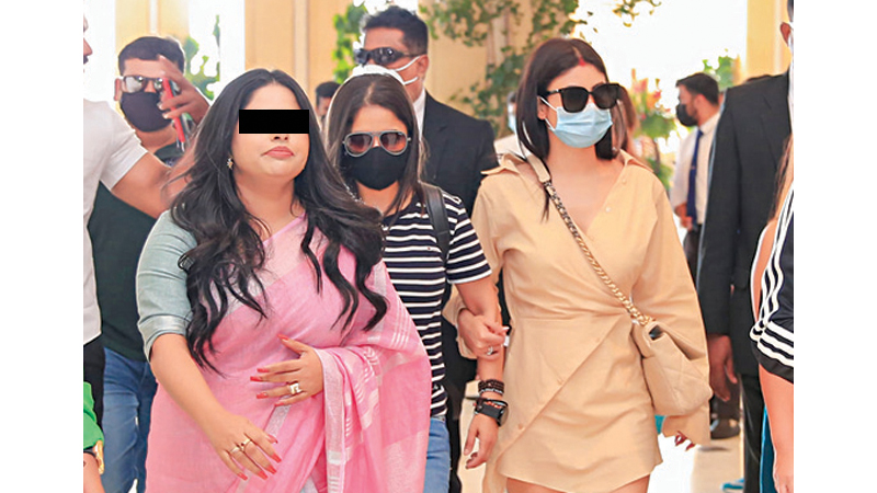 The suspect Thilini  Priyamali with an Indian actress.  
