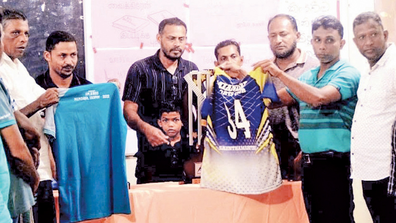 U.K. Najeem unveiling the new jersey and introducing  champion trophy at the event.