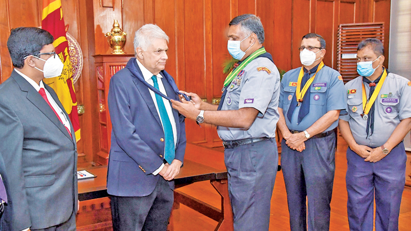 President Ranil Wickremesinghe was officially conferred the title of Chief Scout and Patronus at the President’s Office yesterday. Picture courtesy President’s Media Division
