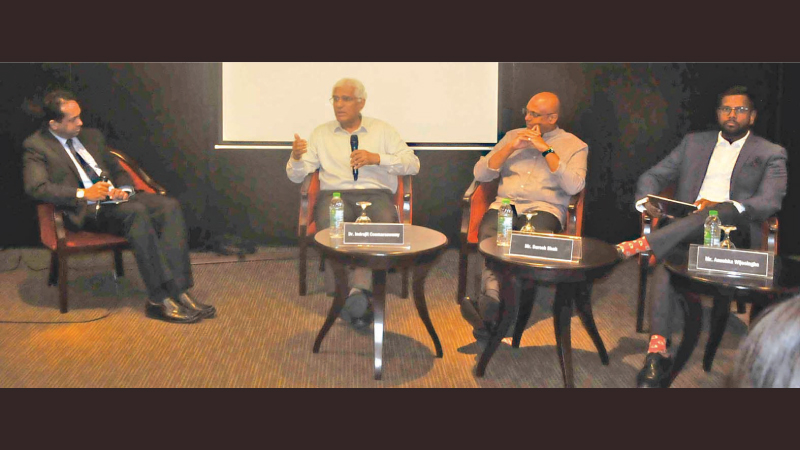 Former CBSL Governor Dr. Indrajit Coomaraswamy and other panelist at the event. Picture by Sudath Malaweera  