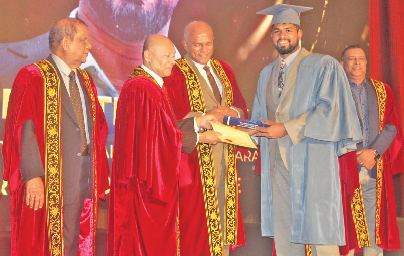 Ateeq  Aslam receiving his certificate. 