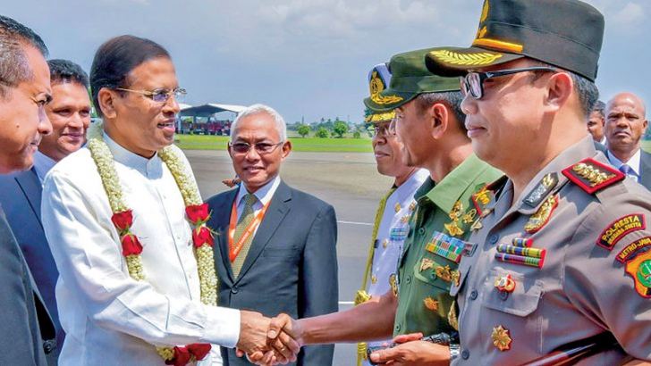   President Maithripala Sirisena arrived at the Jakarta Soekarno-Hatta International Airport yesterday afternoon to attend the Indian Ocean Rim Association Leaders’ Summit. He was warmly received by a special delegation, including Indonesian Public Works and Housing Minister Basuki Hadimuljono. President Sirisena will address the Summit today at 11 am Sri Lankan time. Picture by President’s Media