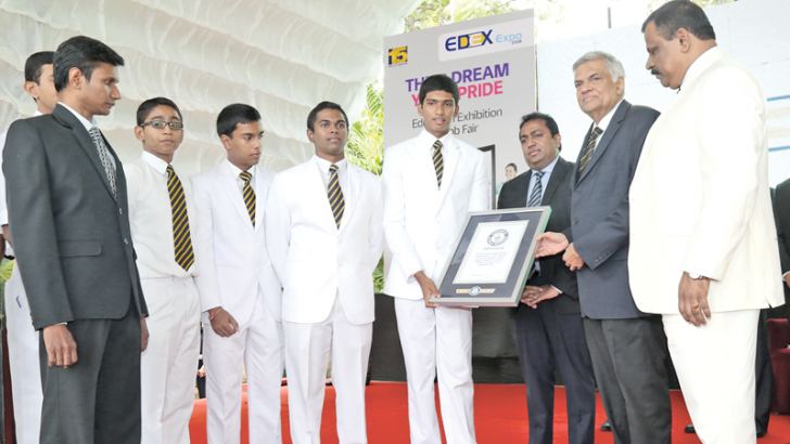 Presenting the Guinness World Record to Prime Minister Ranil Wickremesinghe at the BMICH  