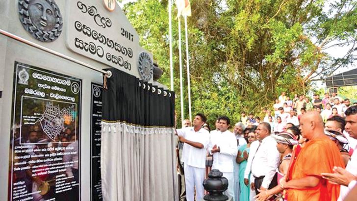 Minister Sajith Premadasa unveiling the plaque of the Senehasa gama. Picture by T.L.A.P. Hemapala, Nagoda Group Corr.