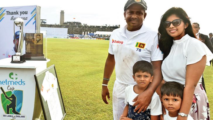 Rangana Herath who retired from international cricket with his wife and two kids after the presentation ceremony. – AFP   