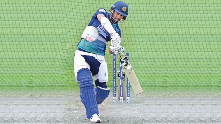 Sri Lanka captain Dimuth Karunaratne was one of the few lucky cricketers to get a knock at the nets before rain disrupted their practice session at the County ground in Bristol on Monday.  – AFP