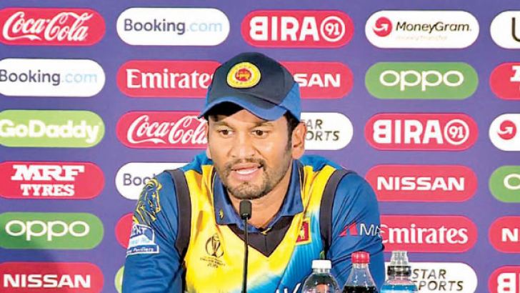 Sri Lanka captain Dimuth Karunaratne addresses the media after his team had suffered their second straight washout in the World Cup against Bangladesh at Bristol on Tuesday. 