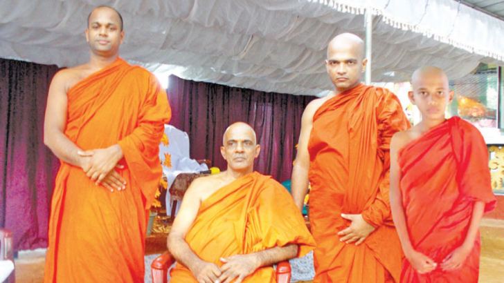 Ven. Batugampala Pangnaloka (son) and Ven. Batugampala Visuddhalankara (father) with their teachers Ven. Jagulle Somaloka and Ven.Athimale Saddhalankara Theras.