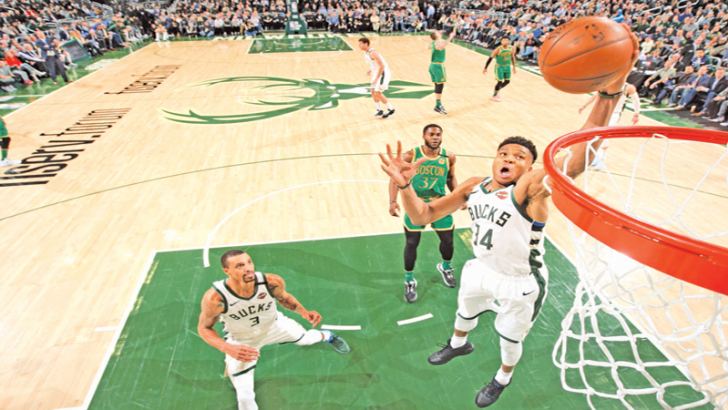 Giannis Antetokounmpo of the Milwaukee Bucks shoots the ball against the Boston Celtics on Thursday at the Fiserv Forum Center in Milwaukee, Wisconsin. - AFP