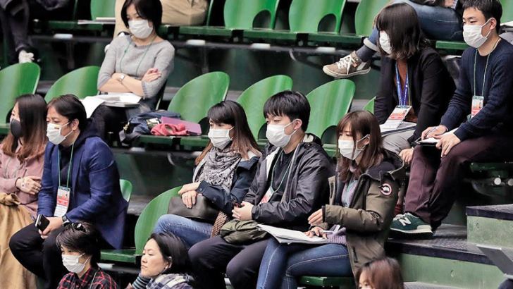 Members of the media wearing face masks are seen during the singles match between Yasutaka Uchiyama of Japan and Roberto Quiroz of Ecuador on day one of the Davis Cup qualifier at the Bourbon Beans Dome in Miki, Hyogo, Japan. The two-day qualifier was held behind closed doors due to the novel coronavirus outbreak.