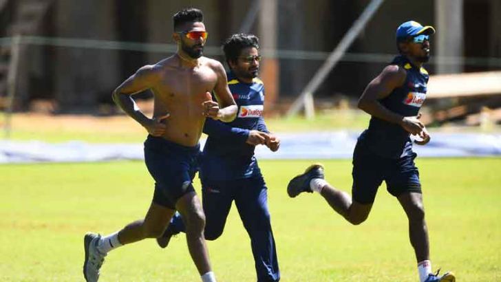 Sri Lanka cricketers Isuru Udana, Kusal Perera and Vishwa Fernando train at the CCC grounds. (Ishara Kodikara, AFP)