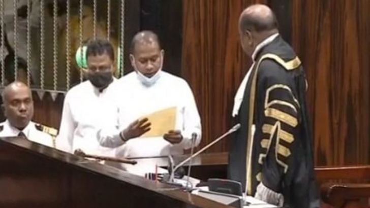Jayasekera swearing in before Speaker Mahinda Yapa Abeywardena.  Picture by Sulochana Gamage.