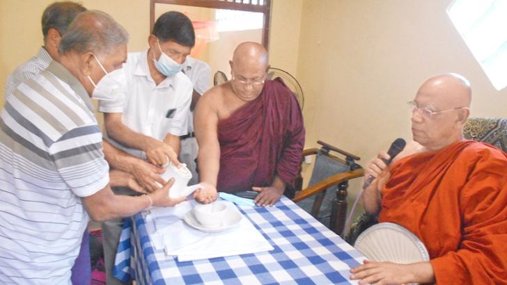Ven. Omalpe Sobitha Nayake Thera delivering blessings at the opening.