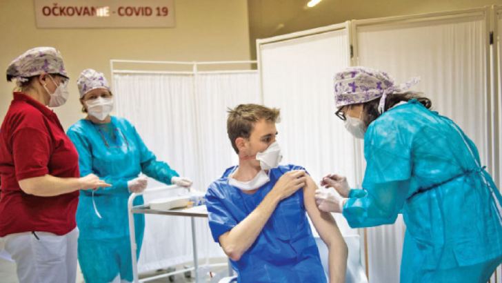 A Covid-19 vaccine being administered in the EU
