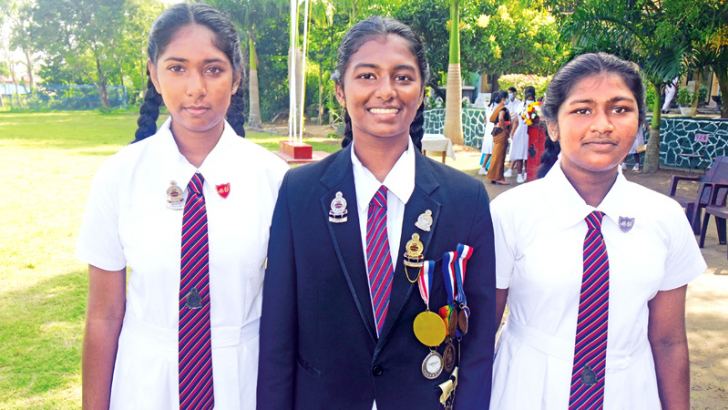 Geethma Senuri talented Soccer player (in the middle)with two prefects.    (Pics. By Upananda Jayasundera-Kandy Sports Spl.Corr 