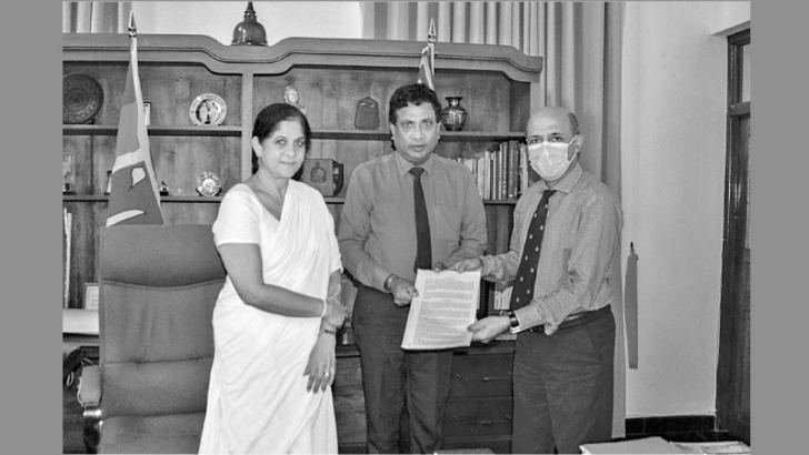 Eastern Province Governor Anuradha Yahampath along with Officials after signing the agreements. Picture by M. S. Abdul Haleem, Mullipothana Group Corr.