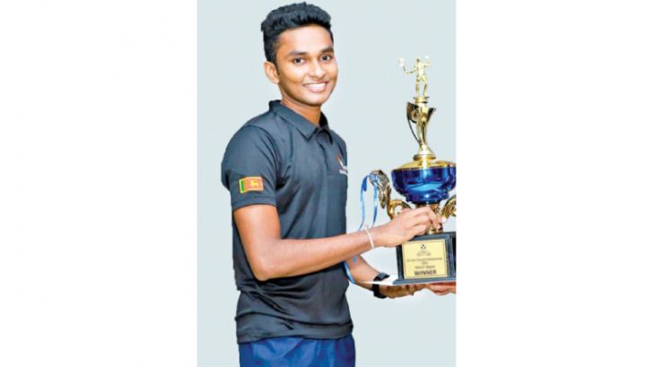 Ravindu Laksiri with his trophy