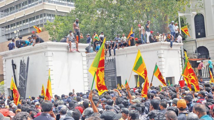 Protesters in their thousands stormed the President’s House, the Presidential Secretariat and Temple Trees on July 9. Picture by Rukmal Gamage