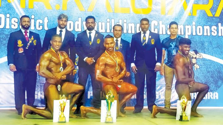 First, second and third place winners of 75kg weight category (Udaya is in middle)