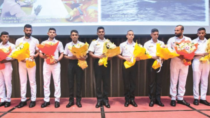 The nine heroic divers who participated in the salvage operation.