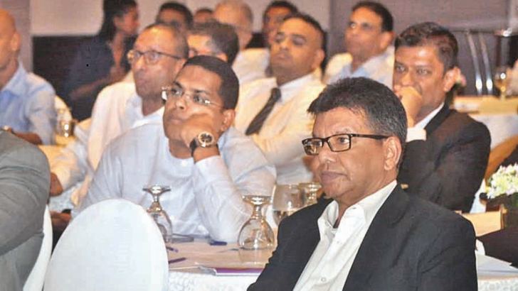 Minister Harin Fernando with Priyantha Fernando and Chalaka Gajabahu at the event. Picture by Sudath Malaweera 