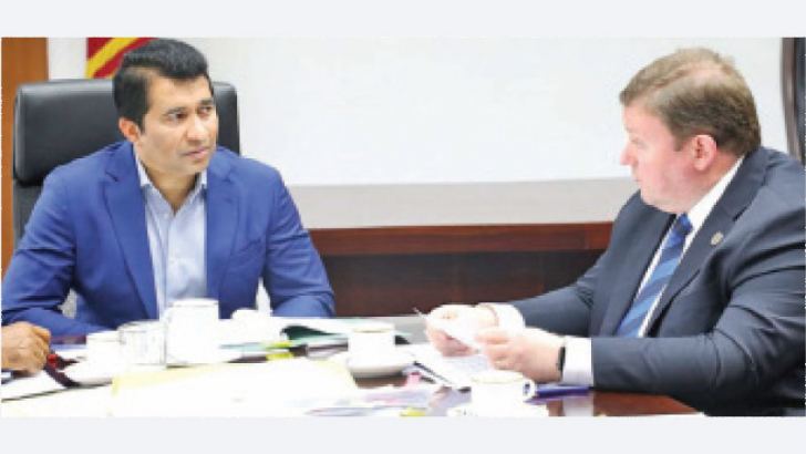 Sports Minister Roshan Ranasinghe with David Carrigy International affairs chief official.